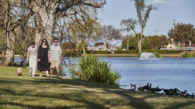 A young family enjoying a walk at Alexandra Gardens in Ararat